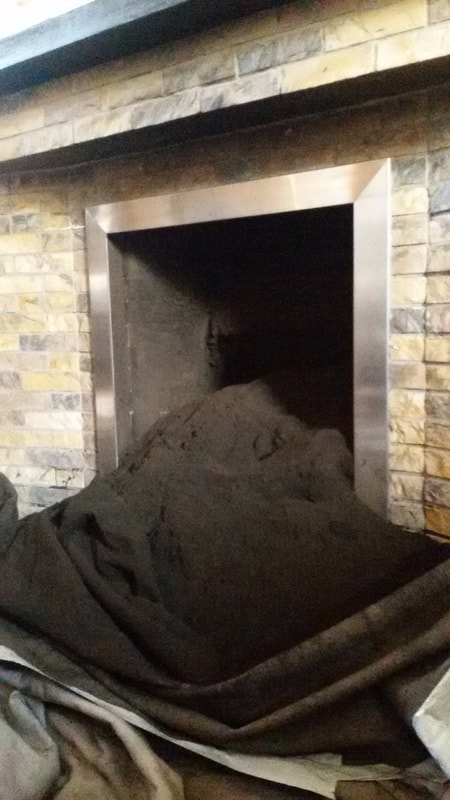 A lot of dust from a chimney after sweeping