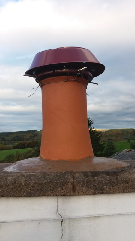 the view of a chimney after a bird guard fitted